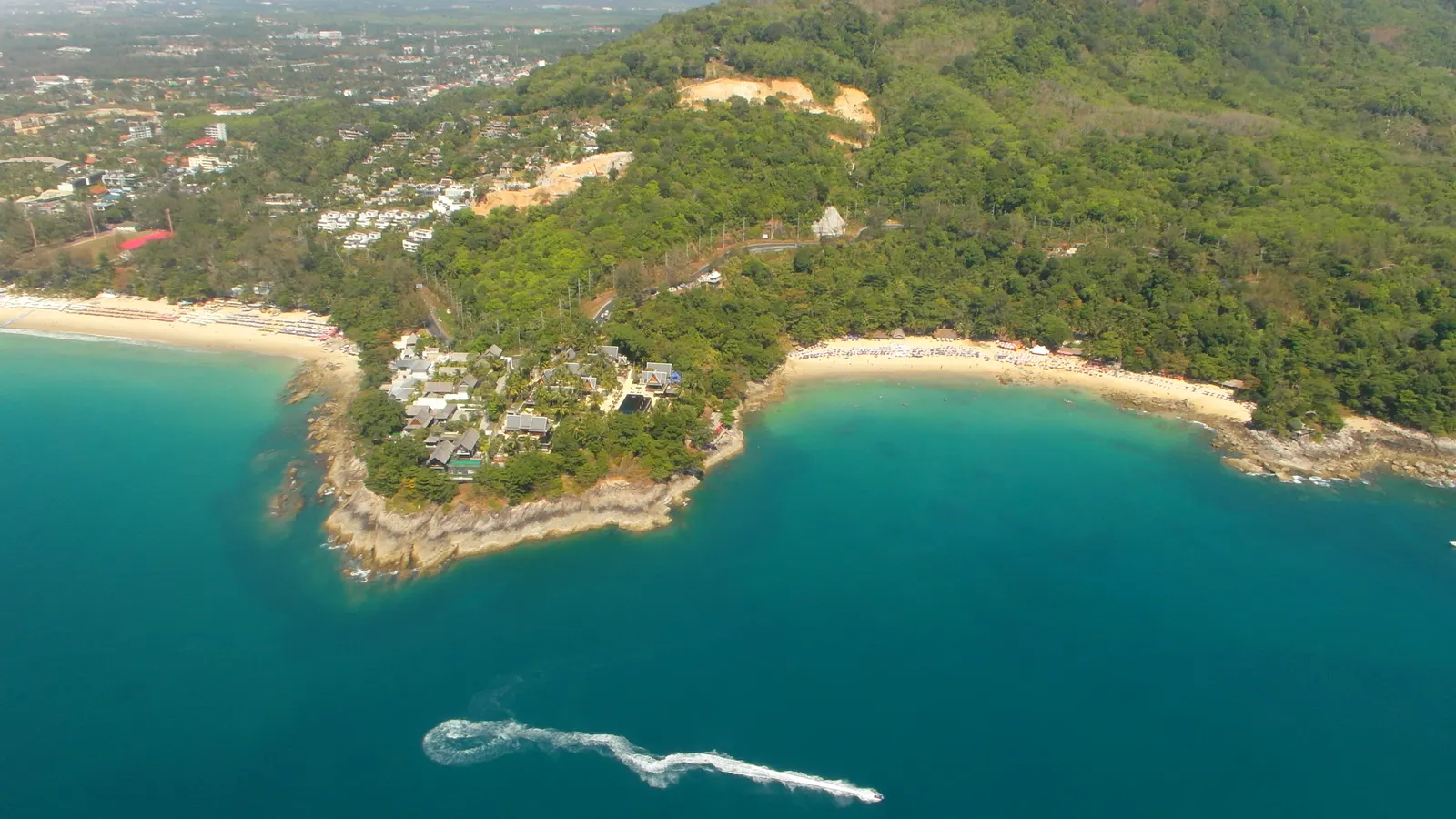 Aerial view of the coastline and headland at Kamala, Phuket
